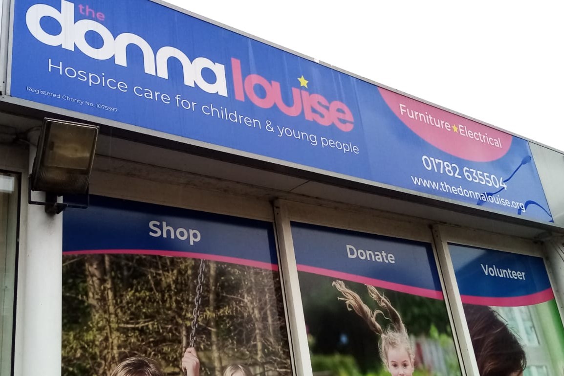 The-Donna-Louise-Childrens-Hospice-Shop-Sign - retail signage and hospitality signage